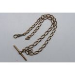 A 9ct rose gold watch chain and T-bar, 36 cm (l), clasp A/F and repaired with base metal,