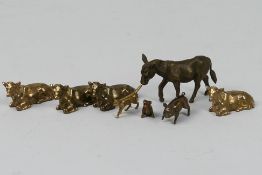 8 x bronze pig, horse, cow, cat, and dog figures. All in similar sizes. Largest is 5 1/2 cm (l).