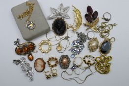 A collection of costume jewellery to include earrings, brooches, rings,