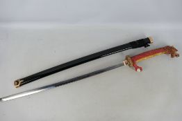 Decorative Japanese style sword with dragon form hilt,