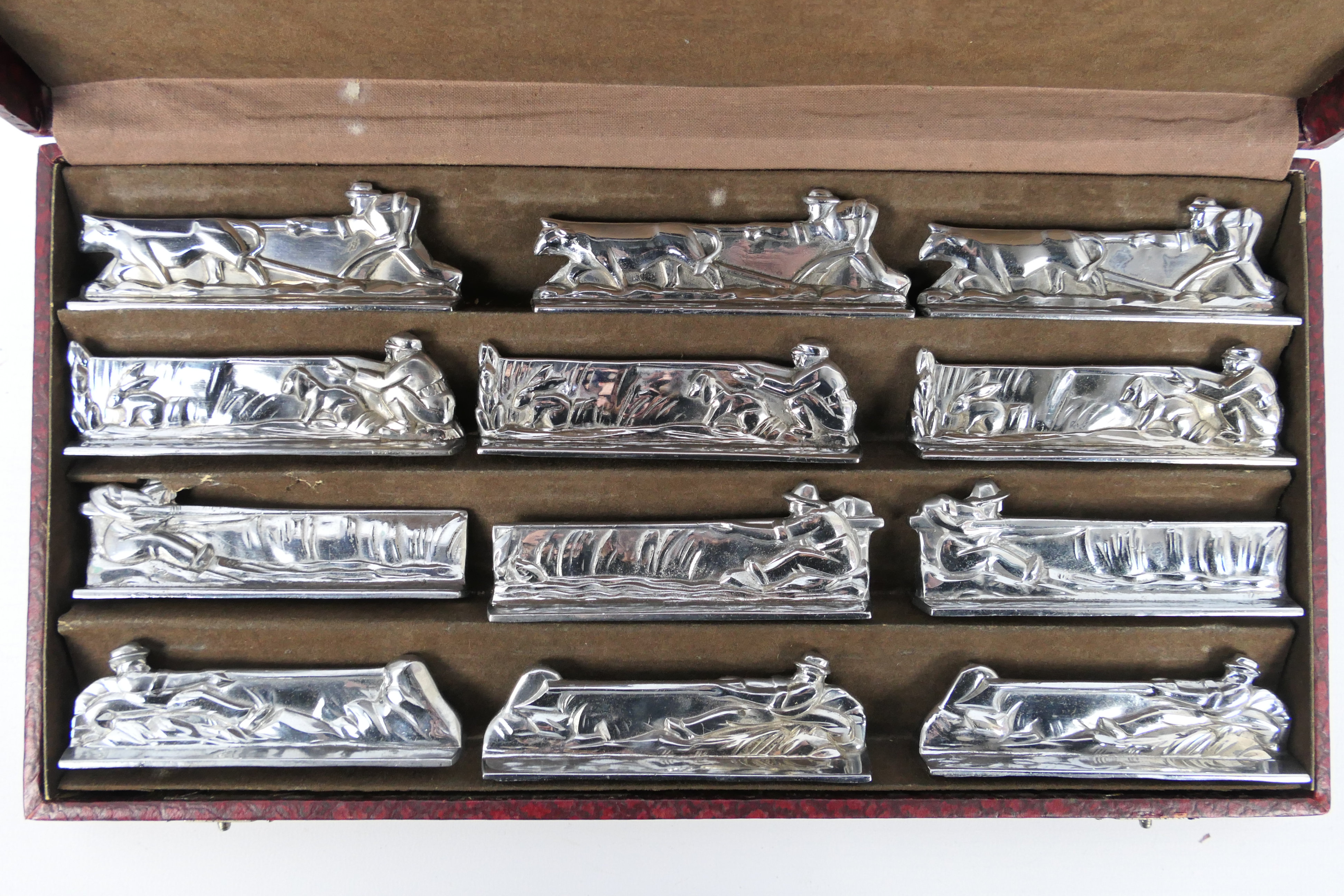 A set of twelve plated knife rests depicting hunting / farming scenes, - Image 2 of 8