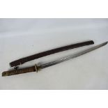 A vintage katana with 67 cm fullered blade, floral decorated tsuba, contained in leather clad saya,