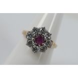 A 9ct yellow gold ruby and cz cluster ring, size M, approximately 3.4 grams all in.