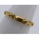 An 18 carat gold ring stamped 750, approx 2.