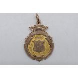 A 9ct gold sporting medal for St Leonards U.F.C Winners Div II 1905-06, approximately 6.9 grams.