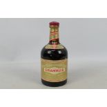 A vintage bottle of Drambuie, no capacity or strength stated, likely a 1970's bottling.