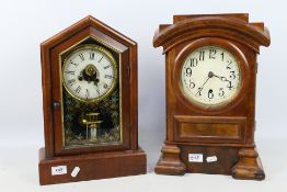 A pair of interesting kitchen shelf clocks,