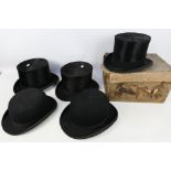 Five vintage hats comprising three top hats and two bowlers, G A Dunn and similar.