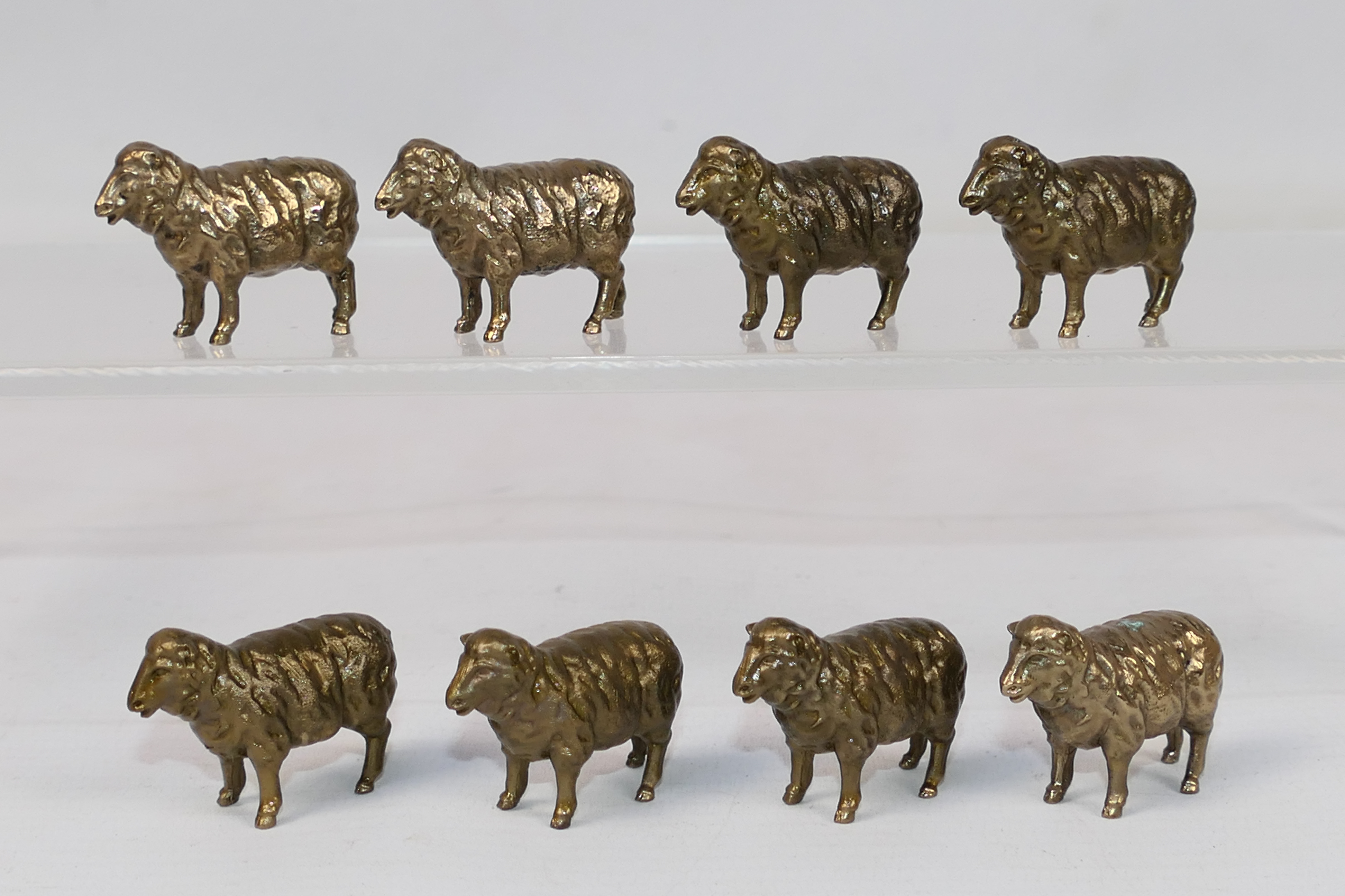 8 x bronze sheep figures. All in same si