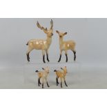 Beswick - A four piece Fallow Deer famil