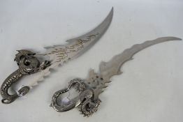 Two decorative Fantasy blades with drago