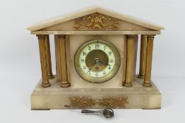 A mantel clock of architectural form, Ar