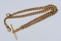 A 9ct rose gold chain and T-bar, 44 cm (l), approximately 34.7 grams / 1.