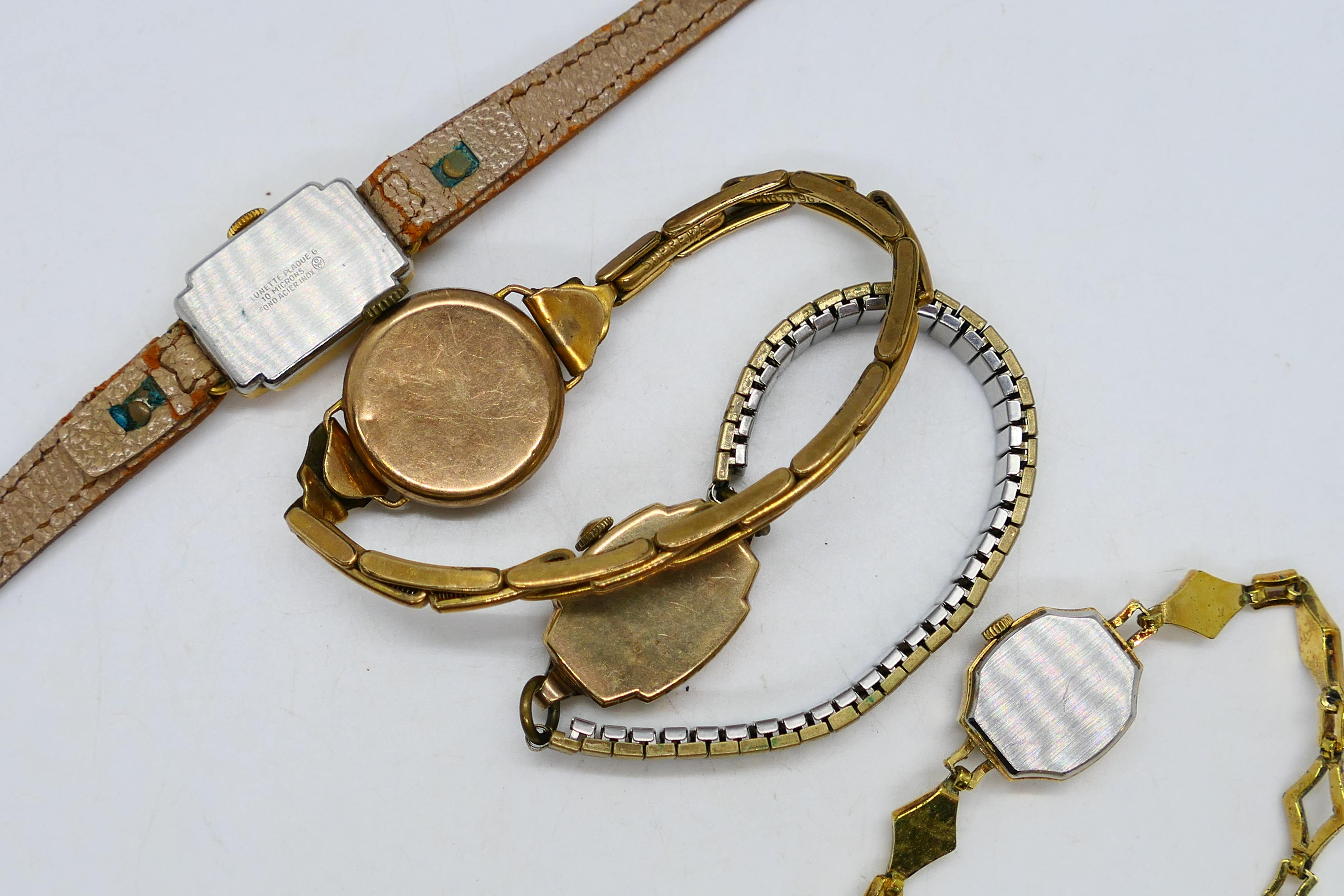 Four lady's wristwatches comprising a yellow metal example with expanding bracelet, - Image 4 of 4