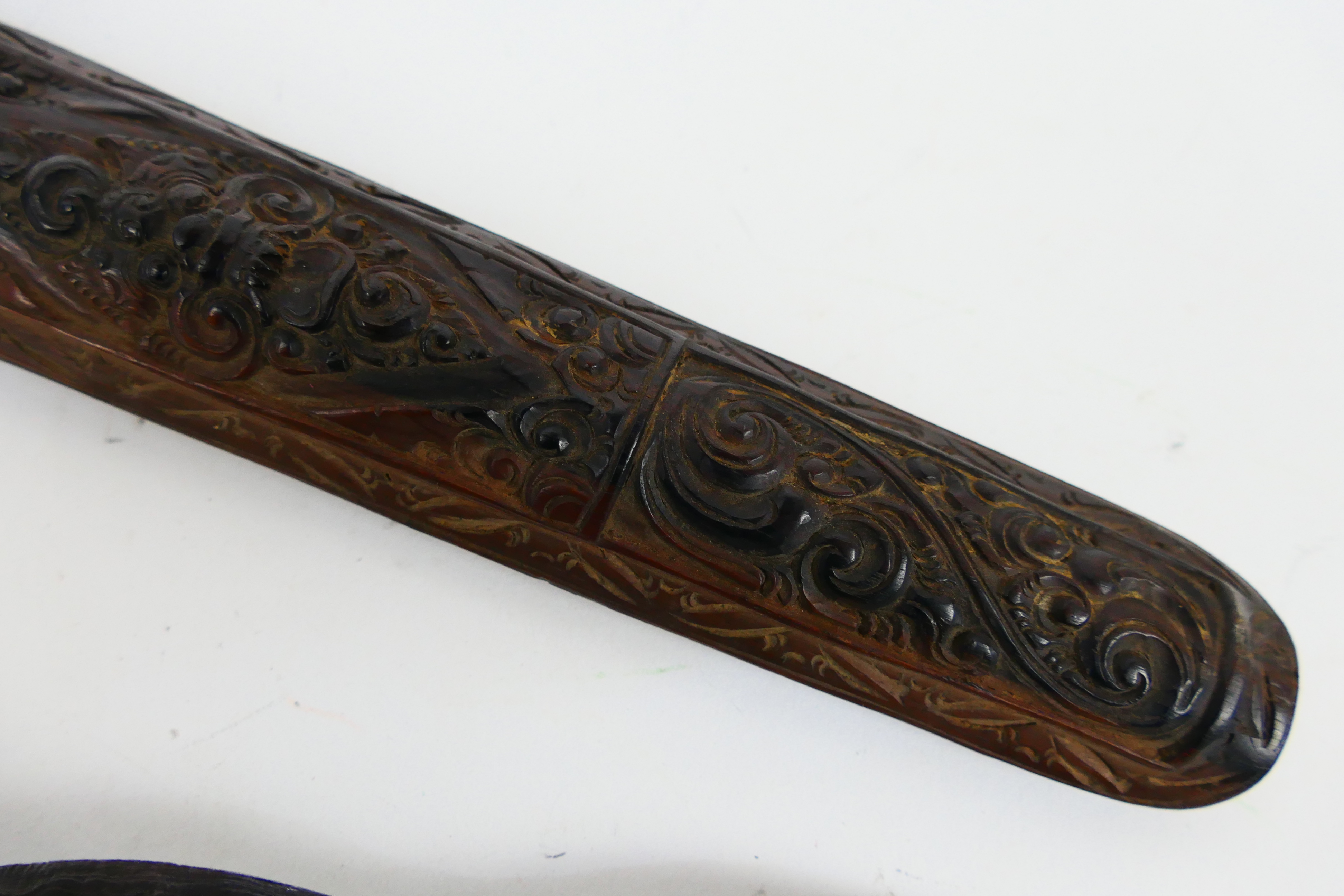 An Indonesian Kris with intricately carved scabbard and hilt, - Image 9 of 9