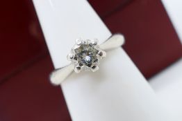 A single stone diamond ring of approximately 0.