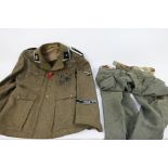 A World War Two (WW2 / WWII) style German SS Unterscharfuhrer tunic bearing Iron Cross 1st Class,