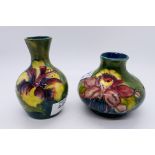Moorcroft Pottery - Two small Moorcroft Pottery vases comprising a squat example decorated in the