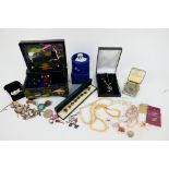 Costume jewellery, a jewellery box and a boxed Swarovski Crystal owl.