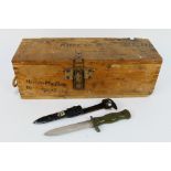 A World War Two (WW2 / WWII) German ammunition crate and a post war German fighting knife Note: