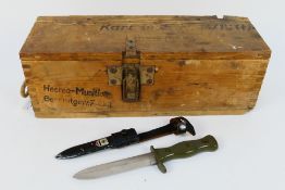 A World War Two (WW2 / WWII) German ammunition crate and a post war German fighting knife Note: