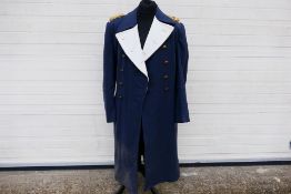 A World War Two (WW2 / WWII) style German greatcoat with shoulder boards.