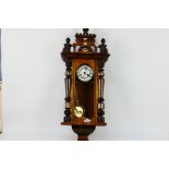 A Vienna style wall clock, the case with turned decoration, glazed door,