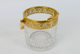 Saint Louis, a crystal ice bucket with gilt rim and handle, acid-etched mark to the base,