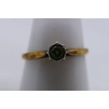 A yellow metal ring, stamped 18ct PLAT, with solitaire illusion set diamond, size Q, 2.2 grams.