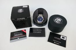 A Citizen Eco-Drive chronograph H500-S0082005, boxed with paperwork.