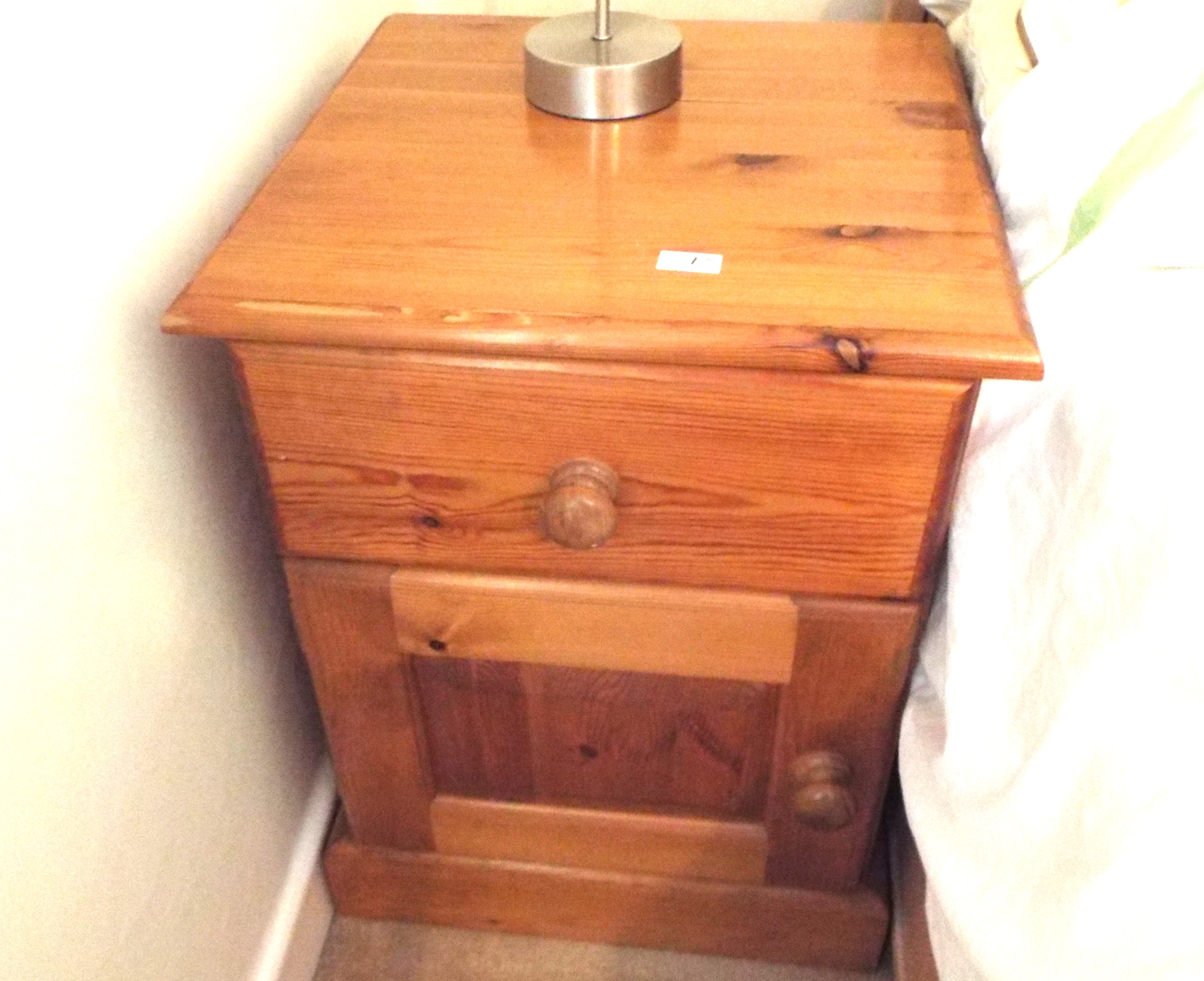 A pair of pine bedside units, each measuring 61.5 cm (h) x 45.