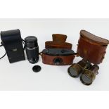 Lot to include an early 20th century pair of British army field glasses,
