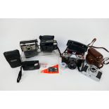 Photography - A collection of vintage cameras to include a Praktica Super TL1000, Pentax Espio 120,