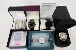 A quantity of boxed fashion watches to include Sekonda, Pulsar, Emporio Armani and other.