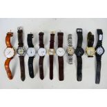 A collection of gentleman's wrist watches to include Casio, Alessi, Lacoste and other.