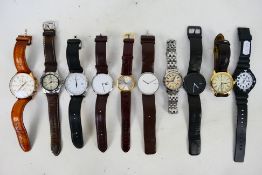A collection of gentleman's wrist watches to include Casio, Alessi, Lacoste and other.