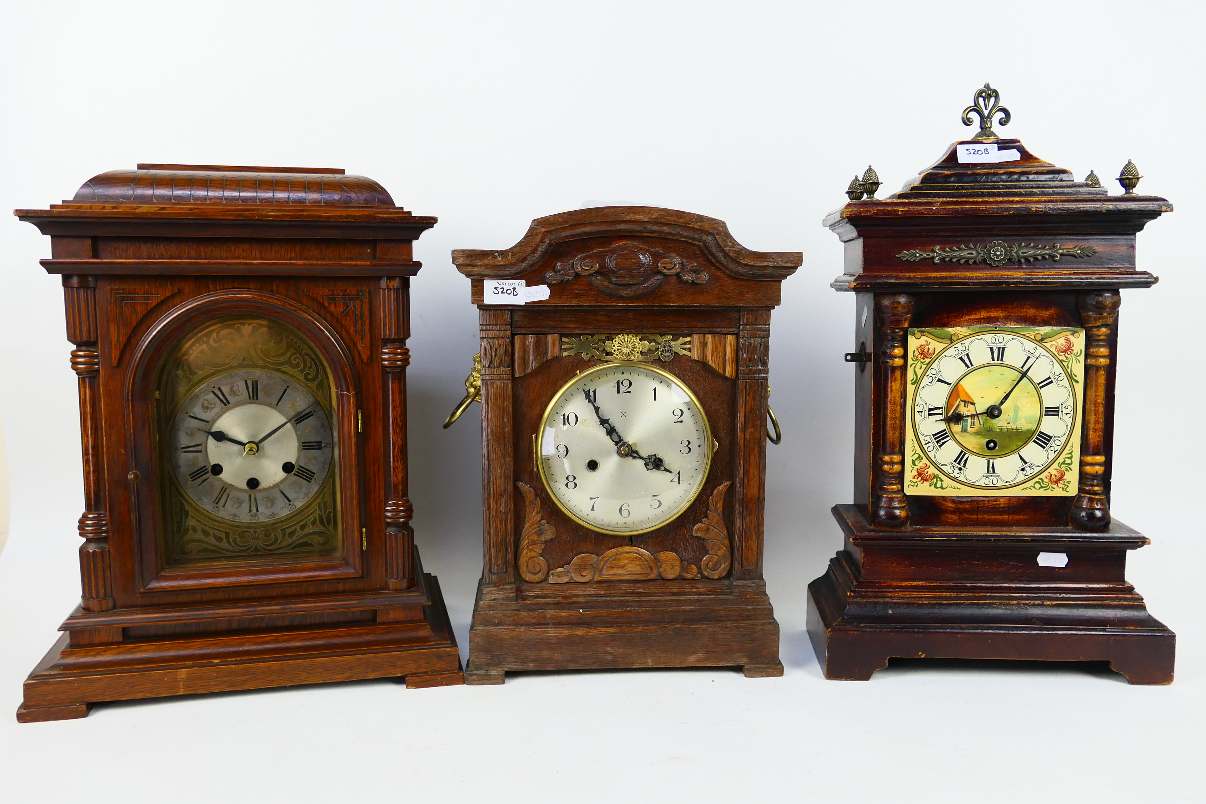 A good lot to include three mantel/ table clocks,