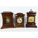 A good lot to include three mantel/ table clocks,