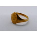 A yellow metal ring, stamped 18ct (shank cut), 3.