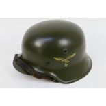 A World War two example of a stahlhelm, the shell interior stamped hkp68 and 3794,