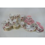 Two tea services comprising Royal Windsor and Queen Anne Pink Harvest.