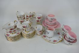 Two tea services comprising Royal Windsor and Queen Anne Pink Harvest.