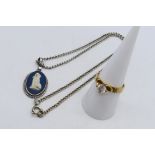 A silver pendant set with Wedgwood Jasperware plaque on white metal chain,