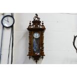 A Vienna style wall clock, the case with turned decoration, glazed door,