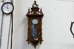A Vienna style wall clock, the case with turned decoration, glazed door,
