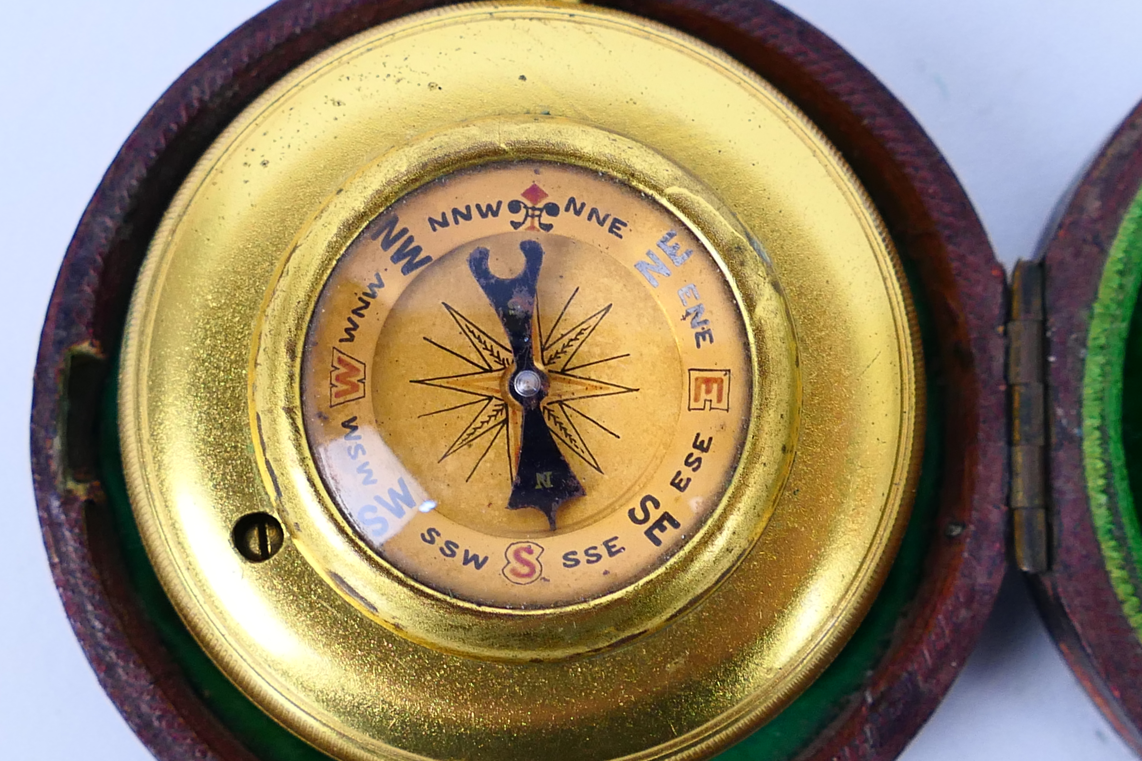 A Chadburn & Son gilt brass cased pocket barometer / compass contained in leather case. - Image 2 of 5