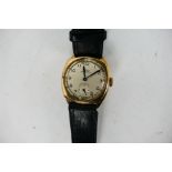 A 9ct yellow gold cased Rone wrist watch on black leather strap.