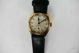 A 9ct yellow gold cased Rone wrist watch on black leather strap.