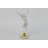 An Art Deco style Hutschenreuther figure depicting a female nude with outstretched arms standing