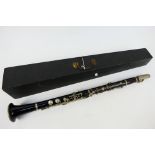 Clarinet. An unbranded clarinet, 65cm in length.